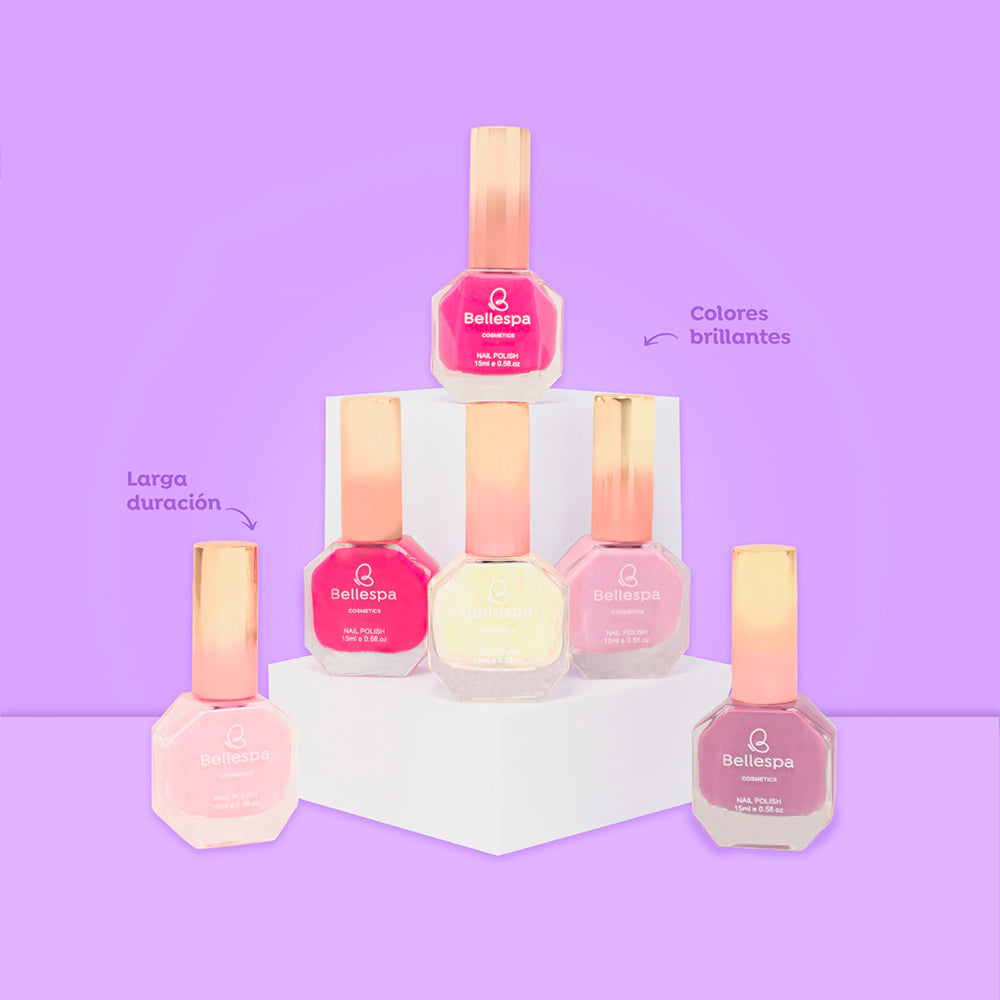 Esmalte de uñas nail polish colores brillantes larga duración Bellespa Cosmetics en tonos rosa coral nude lavanda y malva con frasco geométrico y tapa dorada sobre fondo lila