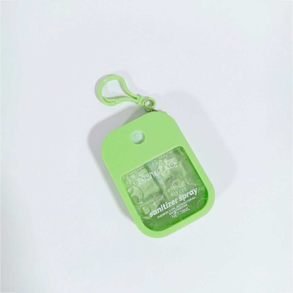 Hand Sanitizer Spray Power Mist 38ml Celin & Coco color verde vista flatlay con mosquetón
