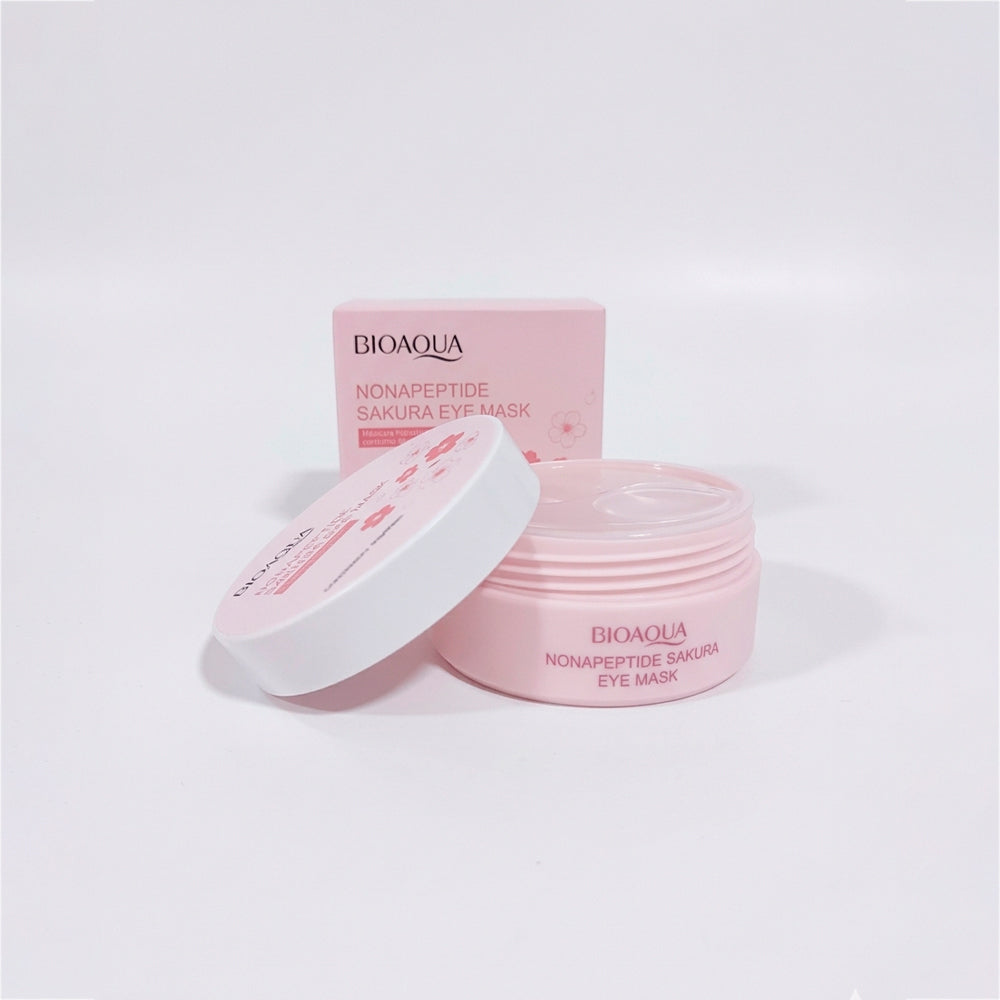 Parches de ojos Nonapeptide Sakura Eye Mask Bioaqua con tapa abierta y caja, envase rosa con parches hidratantes para contorno de ojos