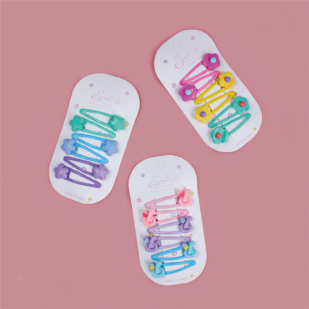 Set de 6 ganchos tic tac Siempre Bella con figuras decorativas en colores pastel flores corazones y mariposas