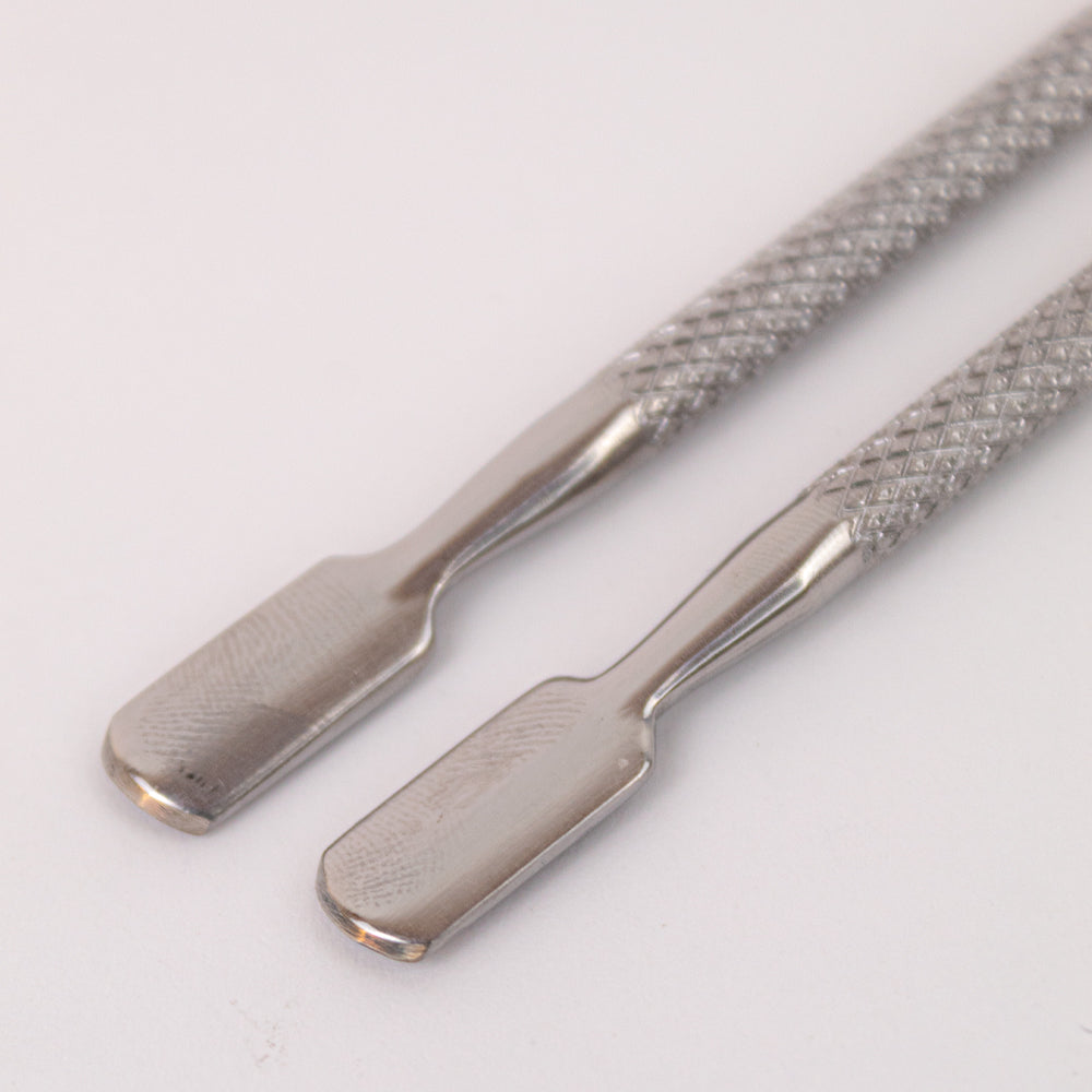 Espatula metal para manicura y pedicure