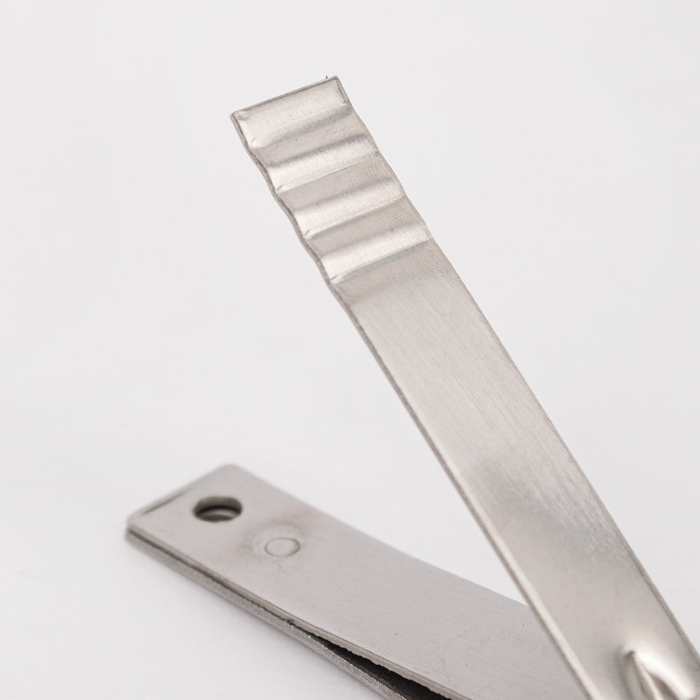 Corta uñas metal labrado