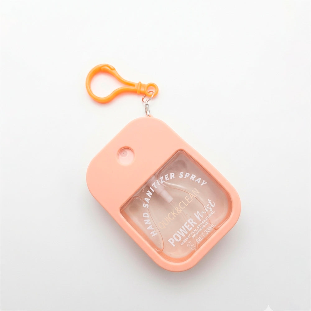 Hand Sanitizer Spray Power Mist 38ml Celin & Coco color salmón vista lateral con mosquetón naranja