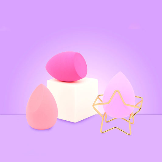 Beauty Blender Skin Baby Set 3 Esponjas Maquillaje – Tres esponjas en tonos rosados con soporte estrella dorado, fondo lila