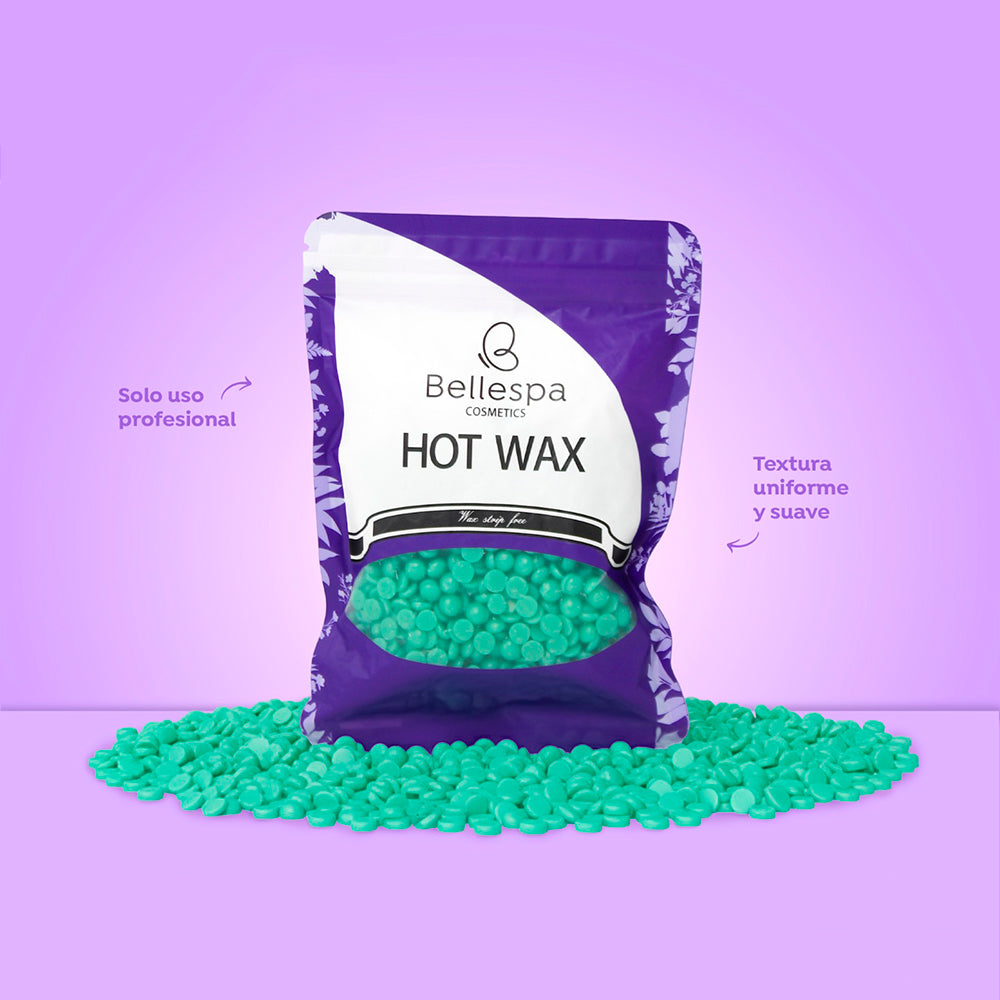 Cera depilatoria en grano Bellespa Hot Wax 100g sin tiras color verde menta en bolsa resellable morada y blanca, textura uniforme y suave, uso profesional, sobre fondo lila