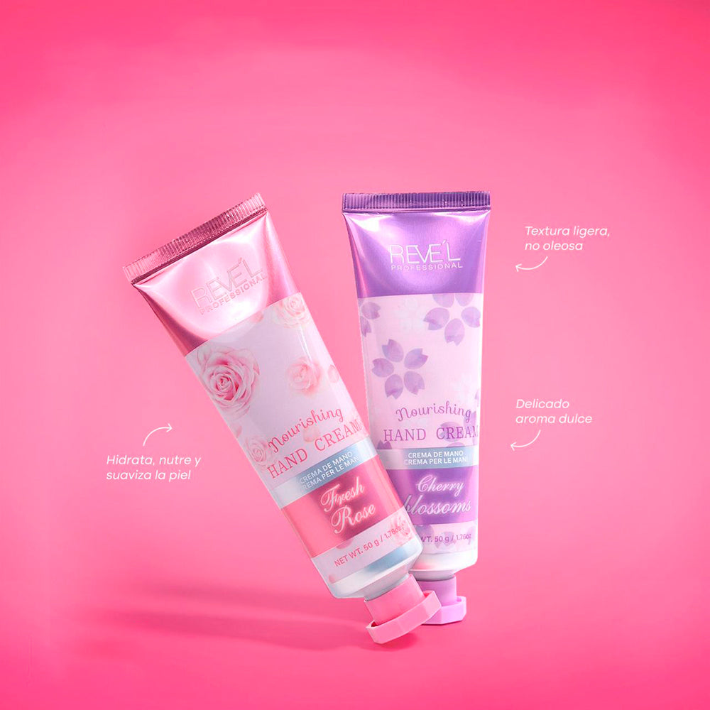 Crema de manos Nourishing Hand Cream 50g Reve'l Professional en fragancias Fresh Rose y Cherry Blossoms textura ligera no oleosa sobre fondo rosado