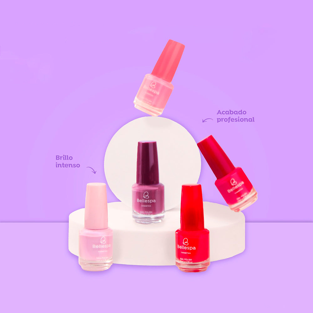 Esmalte de uñas nail polish brillo intenso acabado profesional 15ml Bellespa Cosmetics en rosa palo coral borgoña y rojo con tapa de color a juego sobre fondo lila