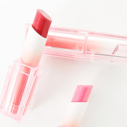 Labial en barra hidratante Ensueño Jarusa con efecto degradado bicolor en tono rojo y rosado detalle de textura