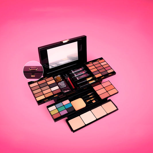 Kit Maquillaje Completo Maletín Full Face Reve'l abierto con espejo integrado mostrando sombras rubores polvos compactos labiales lip gloss glitter y brochas