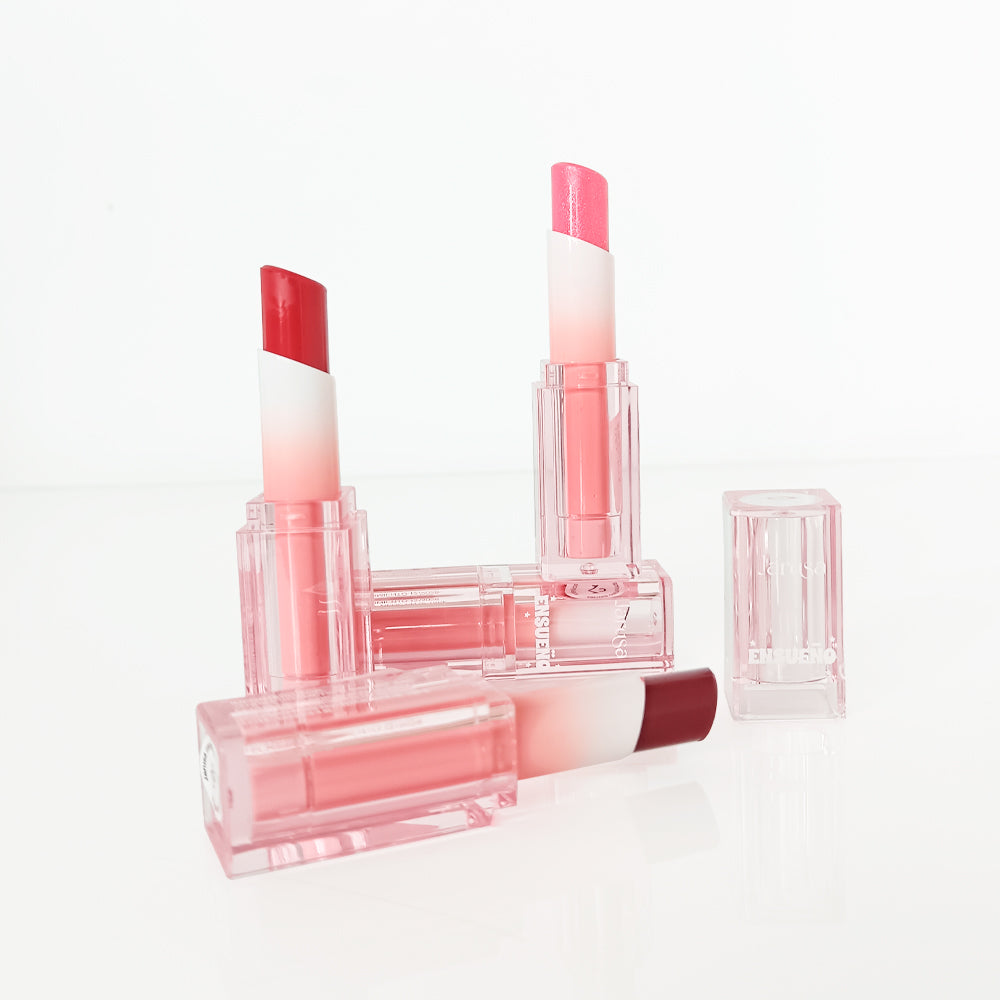 Labial en barra hidratante Ensueño Jarusa con efecto degradado bicolor en estuche transparente en tonos rojo rosado y vino