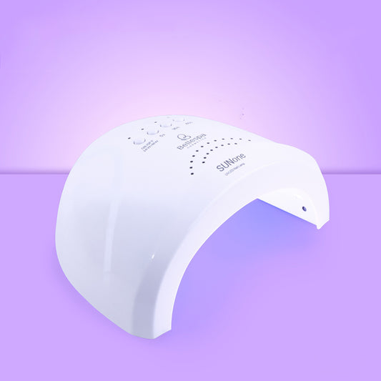 Lámpara UV LED para uñas Bellespa Cosmetics modelo Sun One en color blanco diseño arco compacto con botones de temporizador y orificios de ventilación, disponible en Blanco, Celeste Fuerte y Rosa Suave