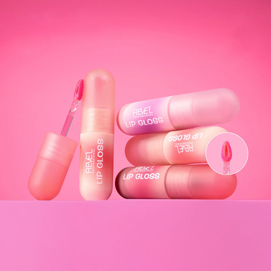 Reve'l Professional Lip Gloss en envase cápsula rosa degradado, acabado brillante jugoso en tonos rosa y coral con aplicador de esponja