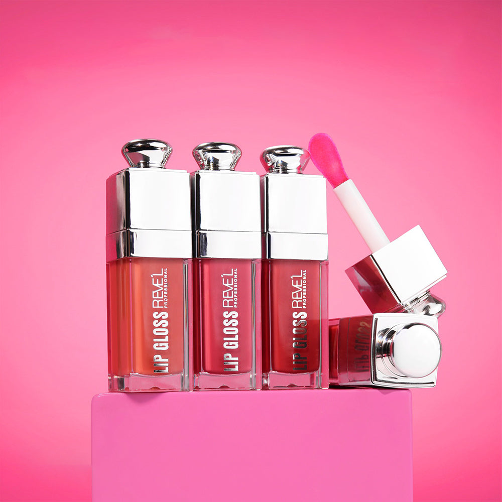 Lip Gloss Glow Reve'l Professional frasco cuadrado cromado con aplicador cushion en tonos nude rosado, rojo vino y rosa fucsia