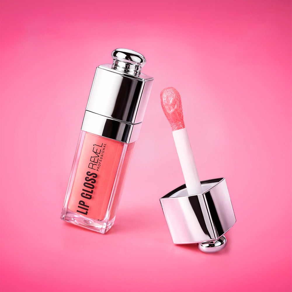 Lip Gloss Glow Reve'l Professional frasco cromado abierto con aplicador cushion mostrando tono rosa nude