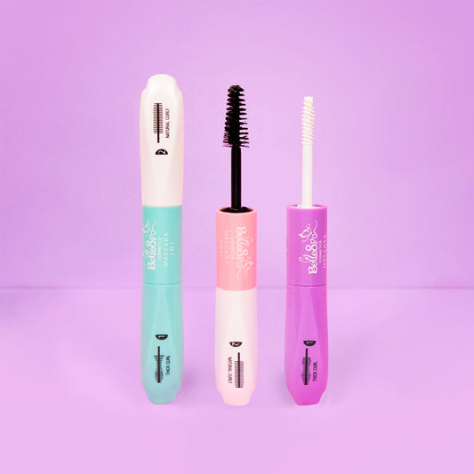 Bellespa Mascara 2 in 1 Thick Curl y Natural Curly en tubos menta, rosa y morado con cepillo negro y peine blanco sobre fondo lila