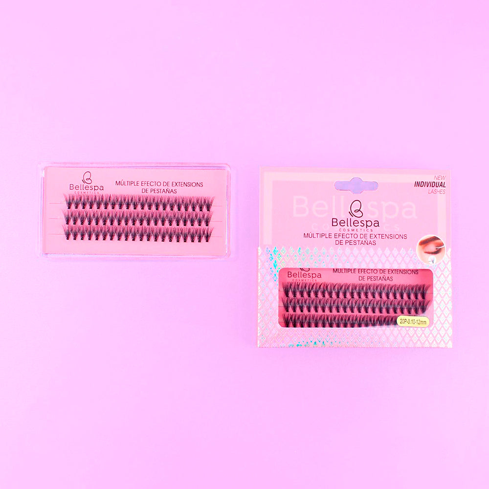 Pestañas postizas múltiple efecto extensions individual lashes Bellespa Cosmetics 12mm con base rosada en empaque rosa sobre fondo lila
