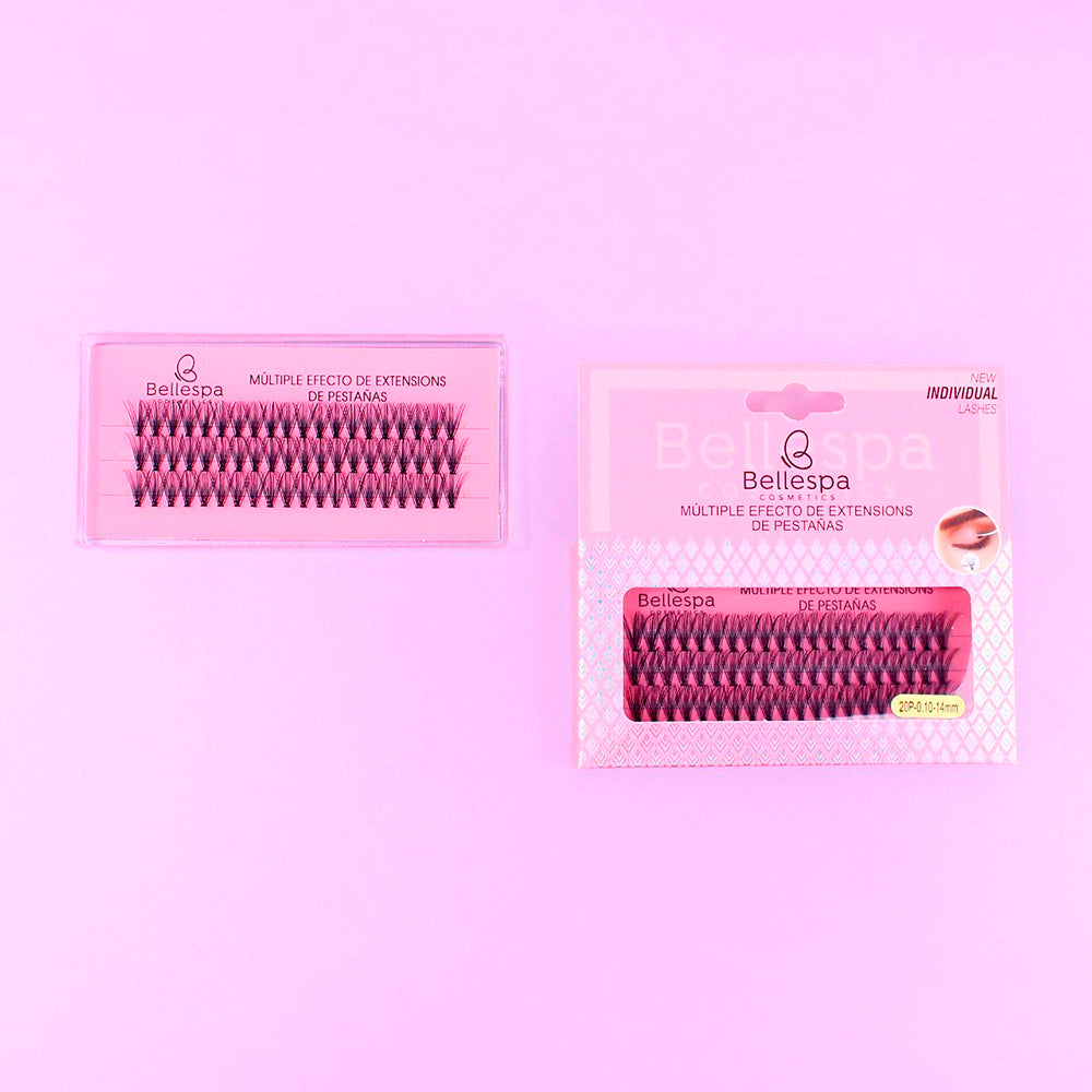 Pestañas postizas múltiple efecto extensions individual lashes Bellespa Cosmetics 14mm con base rosada en empaque rosa sobre fondo lila