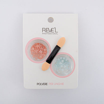 Decoración para uñas Revel Professional polvere per unghie glitter plateado holográfico con aplicador sobre fondo blanco