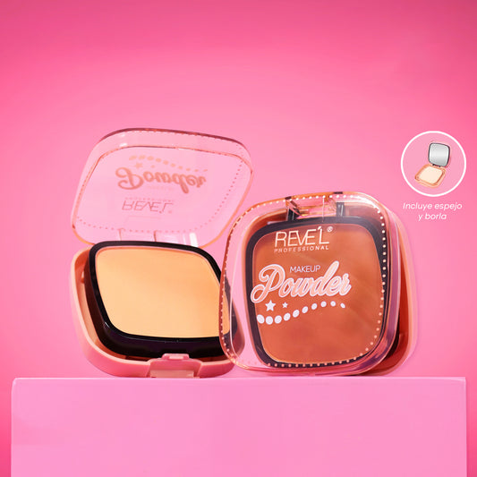 Polvo compacto Makeup Powder Reve'l abierto mostrando espejo y borla en estuche rosa con tapa transparente sobre fondo rosa