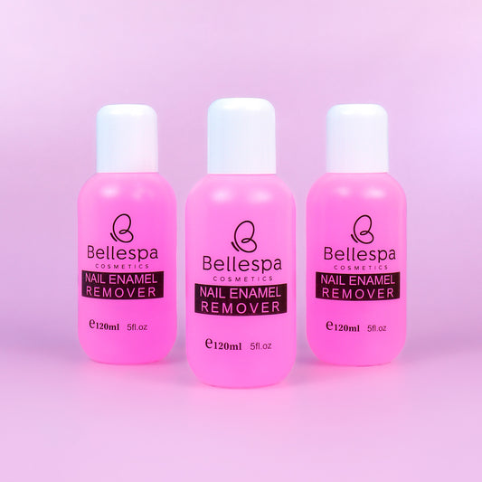 Removedor de esmalte Nail Enamel Remover Bellespa Cosmetics en envase rosa con tapa blanca 120ml sobre fondo lila