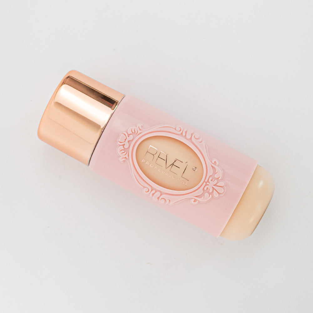 Base líquida crema rosa con tapa dorada vista completa — Reve'l Professional 43 ml