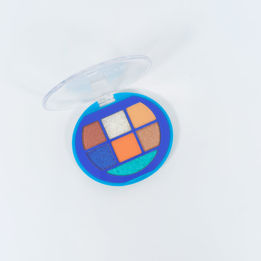 Paleta sombras Glam Eye abierta en tonos teal glitter, naranja, cobre y blanco glitter en estuche redondo azul — Reve'l Professional