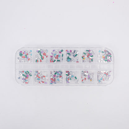 Set adornos para uñas nail art figuras geométricas multicolor en estuche 12 compartimentos sobre fondo blanco