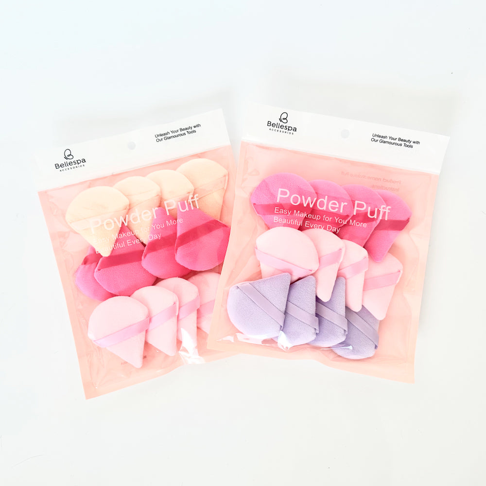 Set de 12 esponjas Powder Puff Bellespa en colores rosa y lila en distintas formas sobre fondo blanco