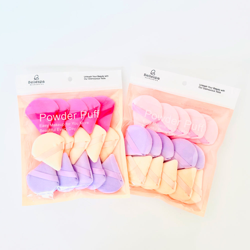 Set de 15 esponjas Powder Puff Bellespa en colores rosa, lila y beige en distintas formas sobre fondo blanco