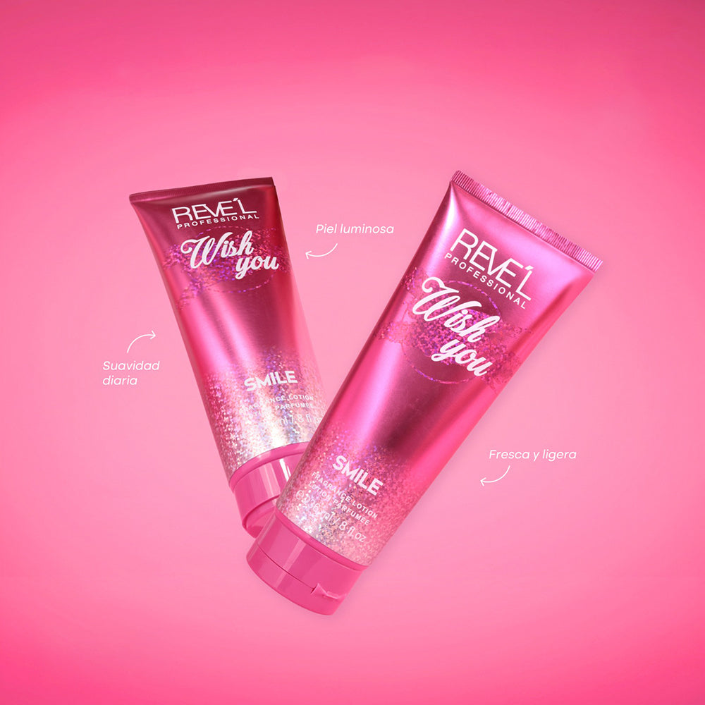 Wish You Smile Loción Corporal Perfumada 236ml Reve'l Professional con diseño holográfico fucsia metálico en dos tubos